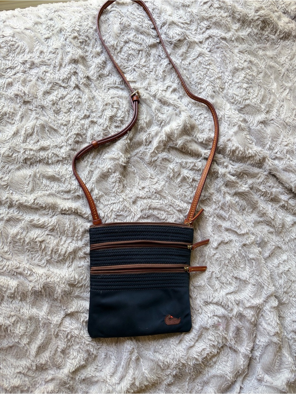 Dooney and Bourke crossbody nylon bag with brown leather straps